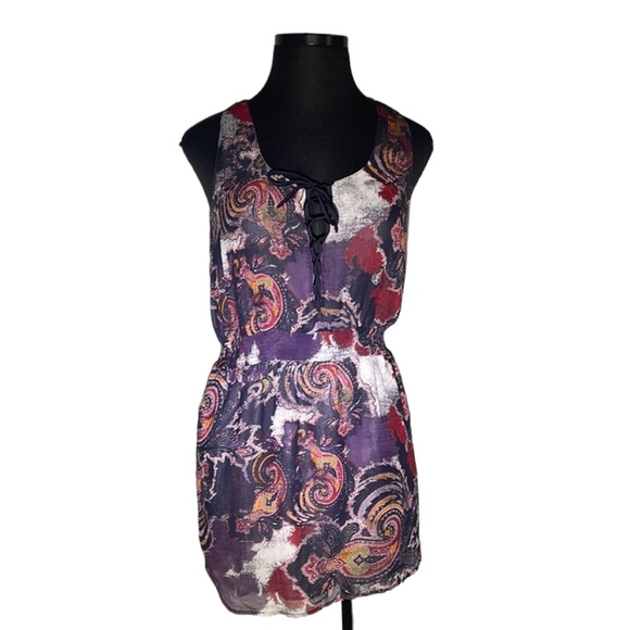 Free People beautiful dress. Size. L. Ties detail in front.  Pockets - Picture 1 of 9